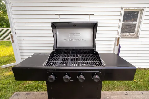 Gas grill on the back patio.
