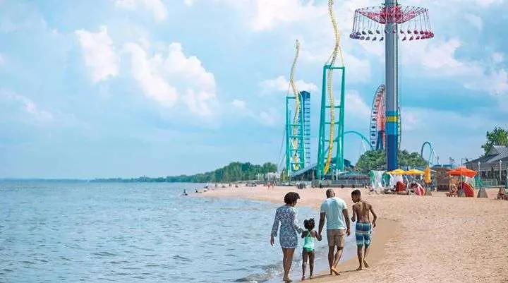 A family enjoying the beach at Cedar Point.